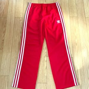 Brand new Red Adidas pants. Unisex.
